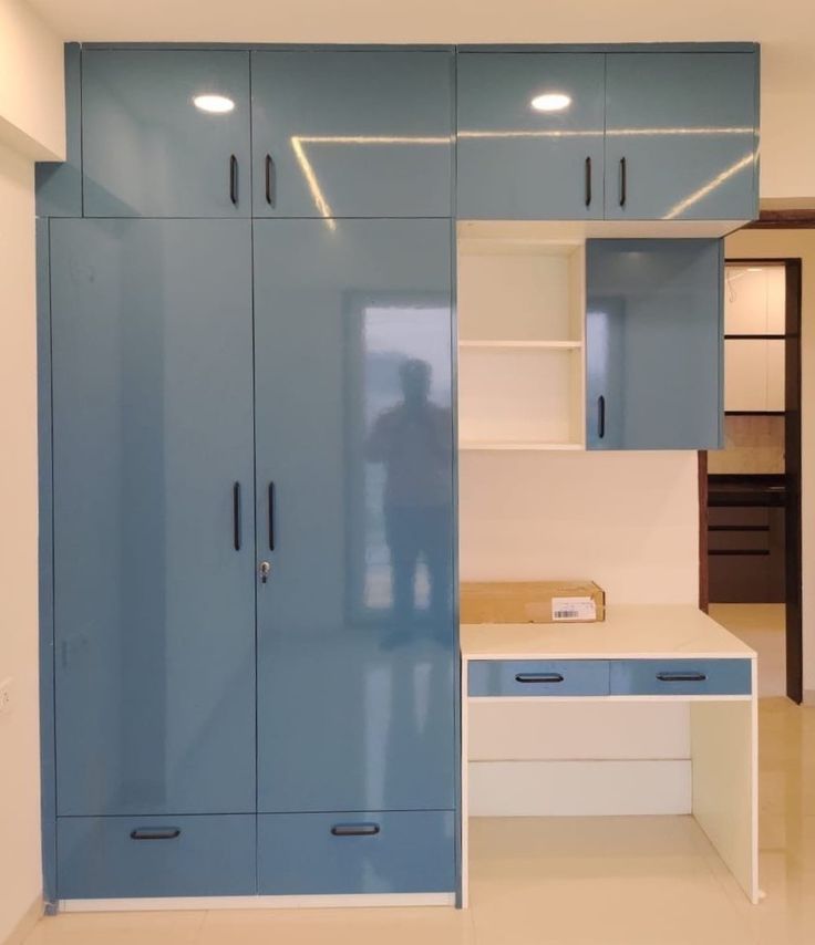 Study With Wardrobes by Divya Interior Designer